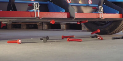 Magnetic sweeper behind the car. Cleaning large spaces from ferromagnetic objects (screws, sheet metal cuttings, nails).